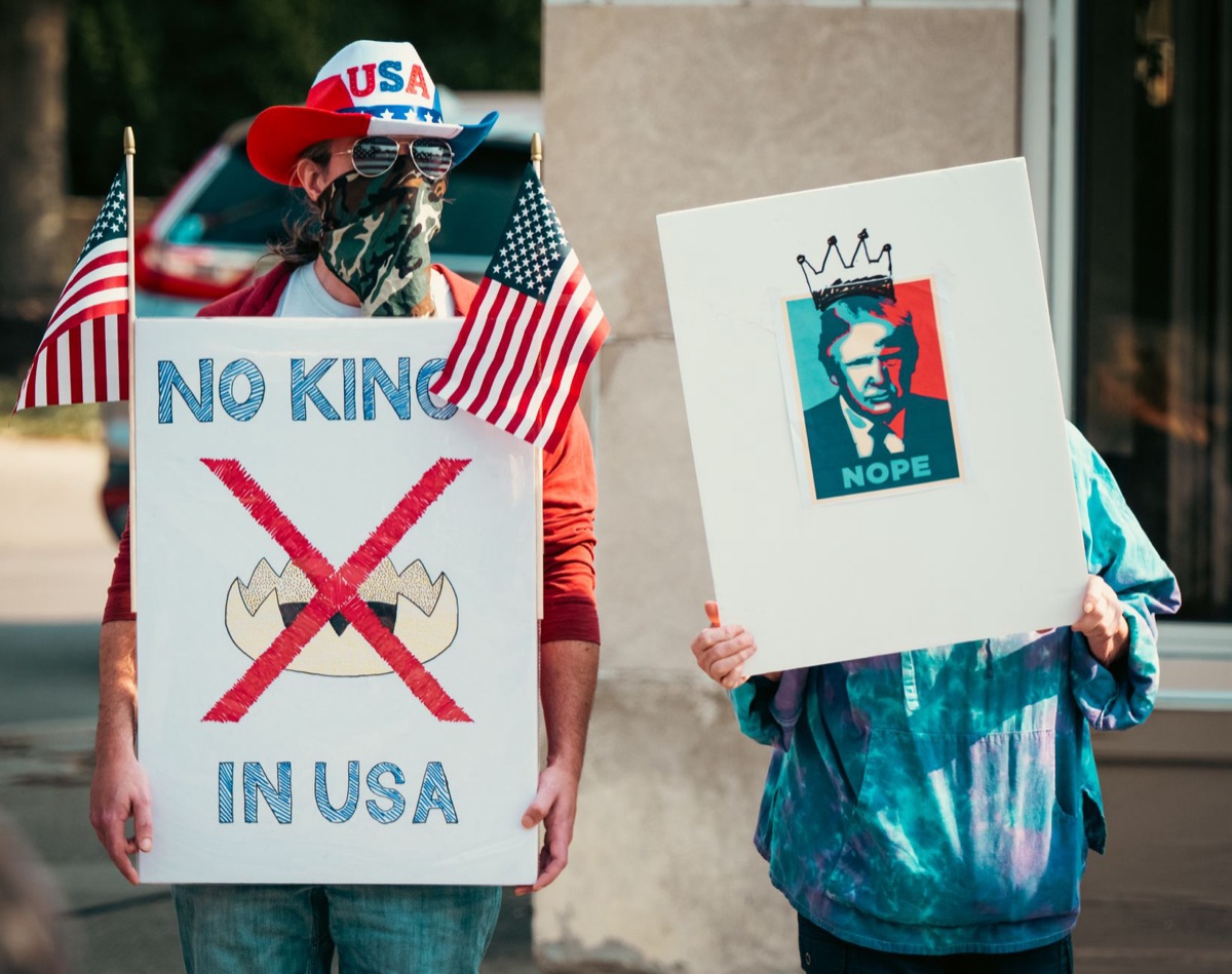american youTuber with protest signs