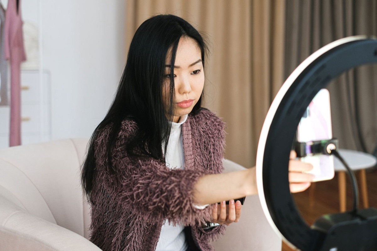 Influencer collaborating with brand in studio